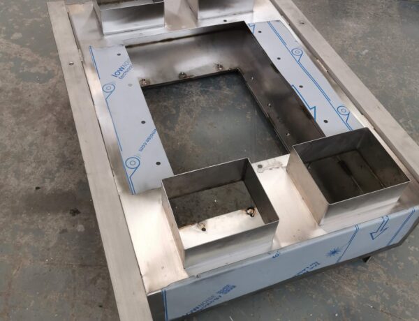 Stainless steel machine ducting box with recessed box opening