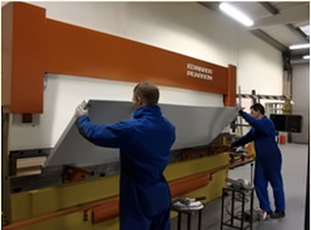 Fabricators folding sheet steel on the CNC press brake at SAMS Fabrications