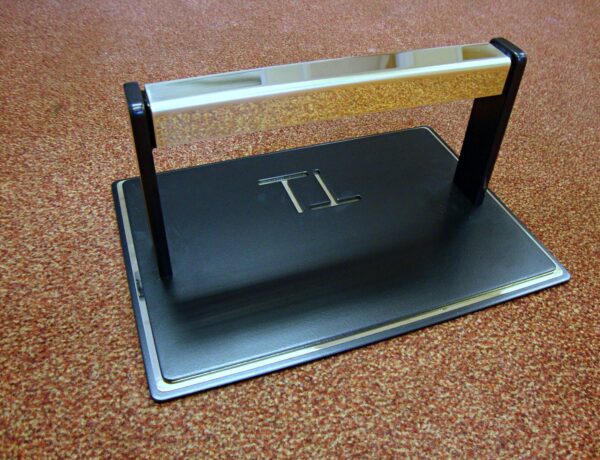 Bespoke brass sign on a black steel stand