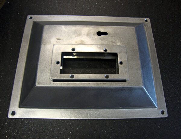 CNC punched plate with formed recess