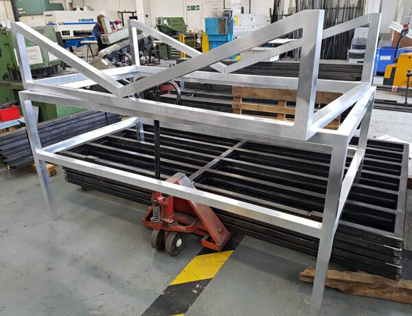 Aluminium frame assembly on a workshop trolley