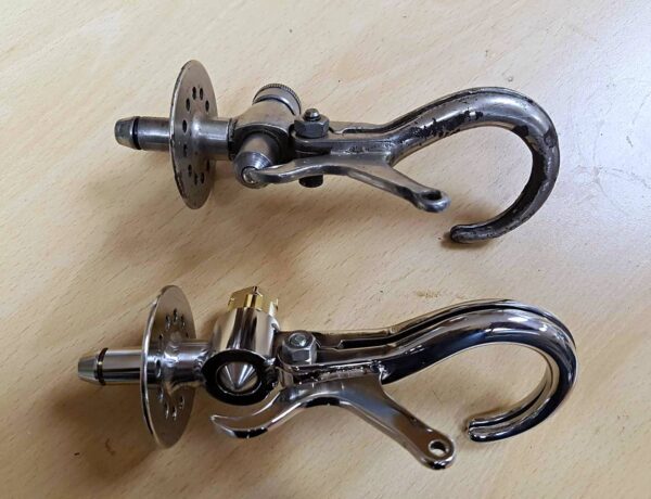 Pair of polished stainless prosthetic arm hooks