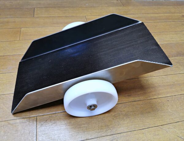 Non slip steel dolly unit with nylon roller