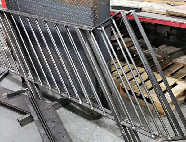 Fabricated mild steel balustrade and railing panels in the workshop