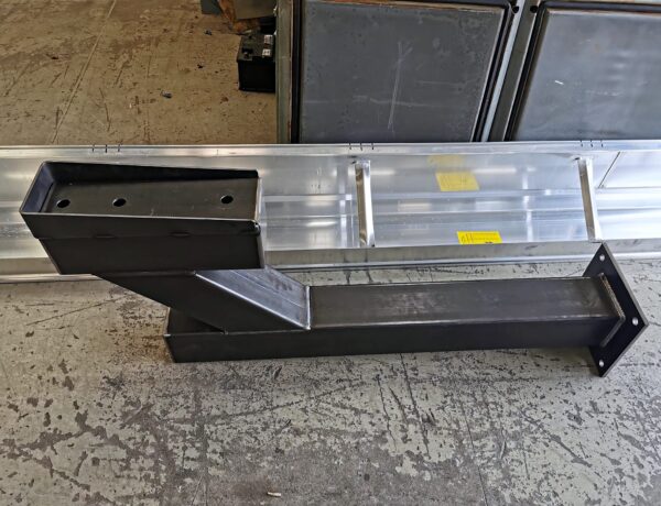 Black powder-coated steel intercom mounting with rain guard