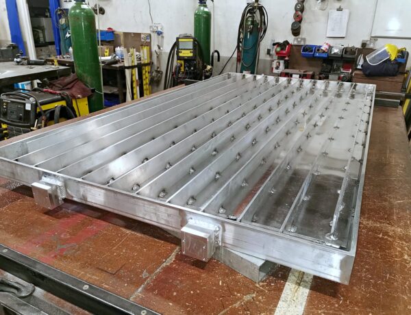 Large ribbed aluminium fabricated tray panel