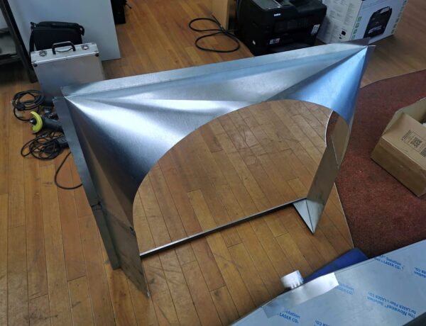 Curved stainless sheet cone formed in the workshop