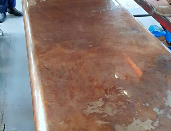 Aged brass counter top with patina finish