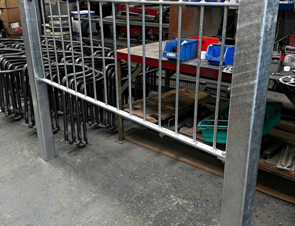 Fabricated steel fence section in the workshop
