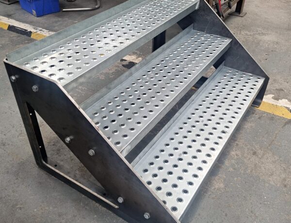 Perforated stainless steel step and platform unit