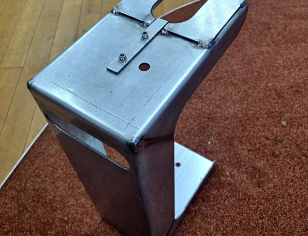 Folded steel box-section pedestal leg