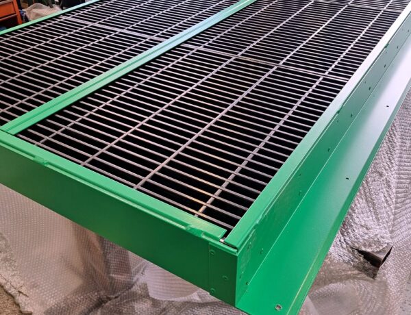 Green powder-coated louvre vent with Intumescent fire panels fabricated to order