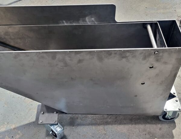 Welded mild steel feed hopper on a wheeled trolley