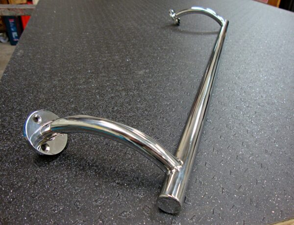 Curved polished handle with wall brackets