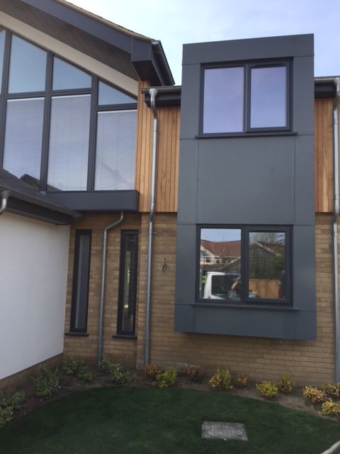 Powder-coated metal cladding and window surrounds by SAMS Fabrications