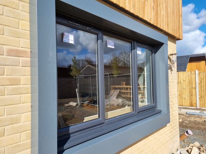 Pressed window surround and cill
